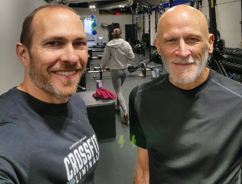 Nick Johnson with a gym member