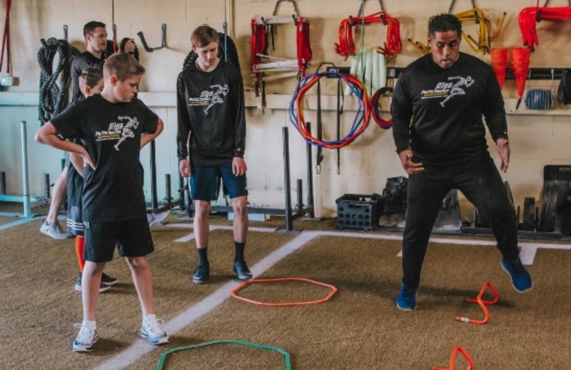 Leland coaching youth athletes